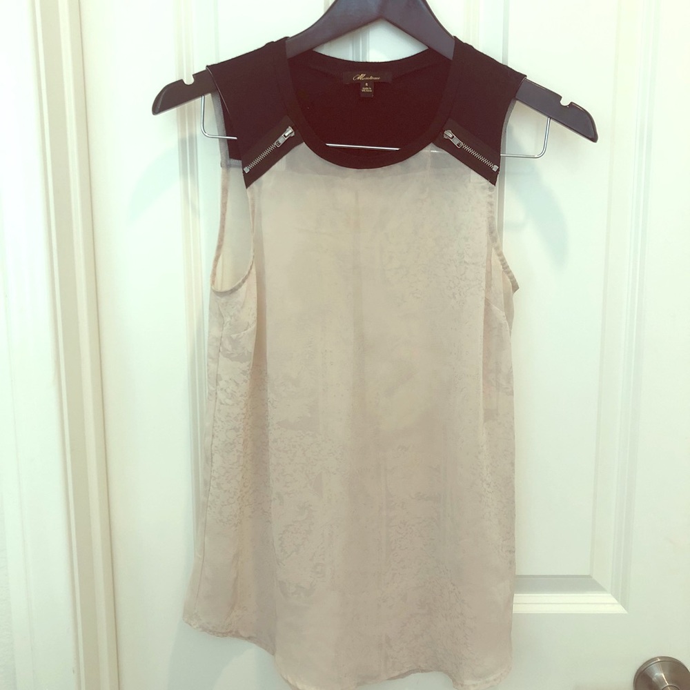 Sleeveless top with zipper detail and sheer bottom